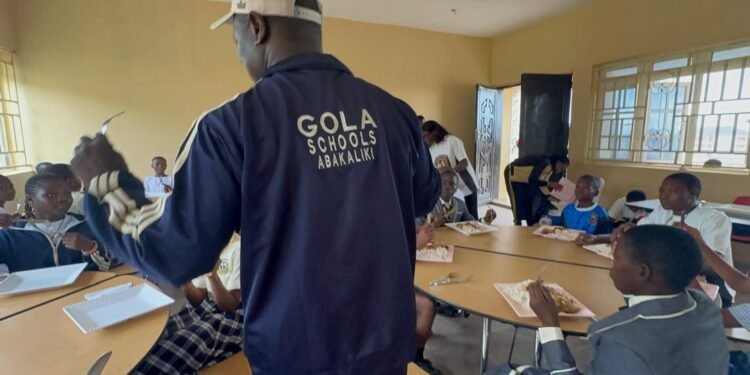 Father Peter Omogo Investing in Education and Leadership Development